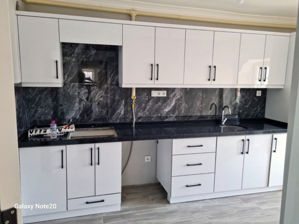 burhaniye kemer sitesinde satilik daire 16